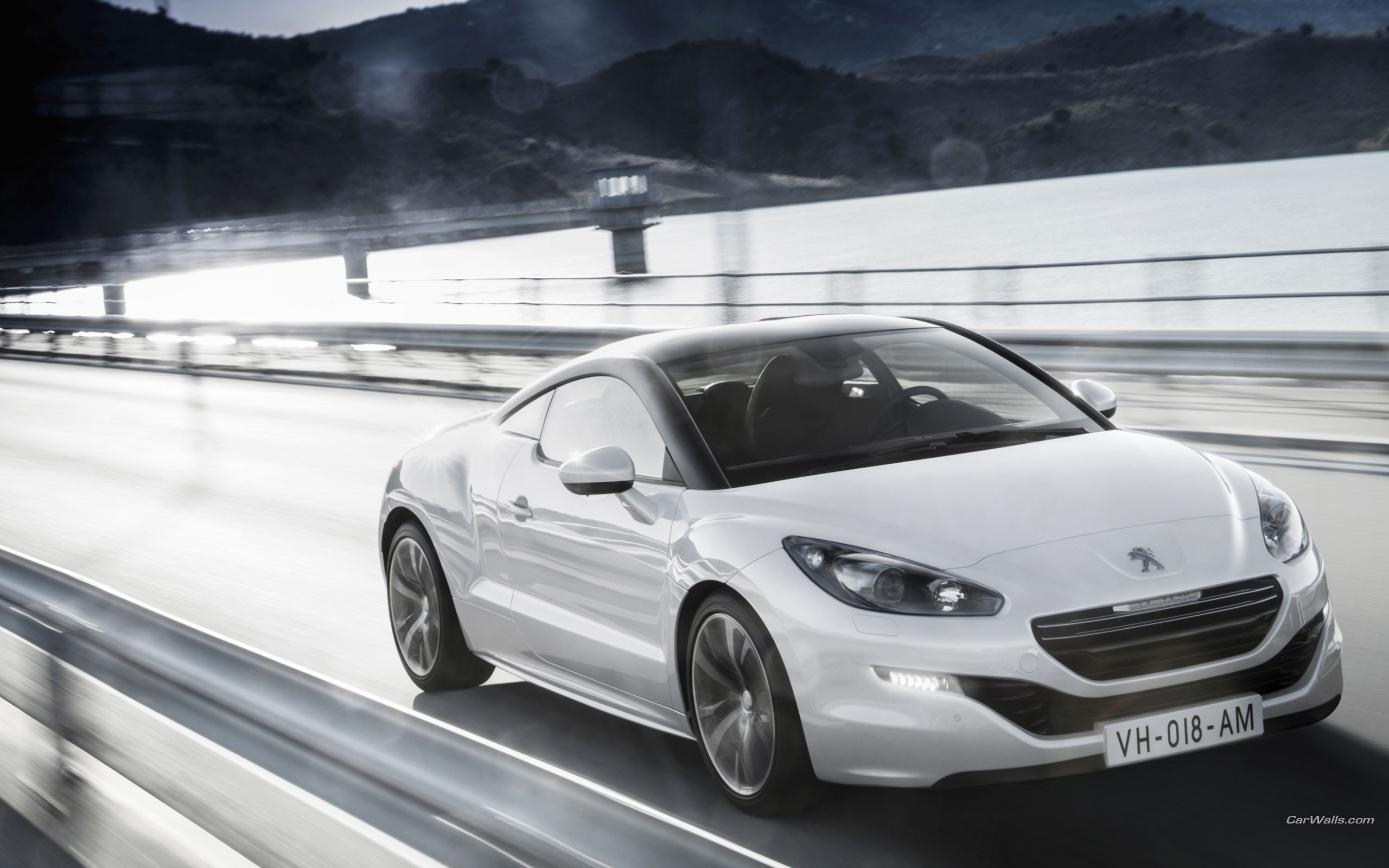 401435_Peugeot_RCZ_avto_mashiny_avtomobili_2560x1600_(www.GdeFon.ru).jpg